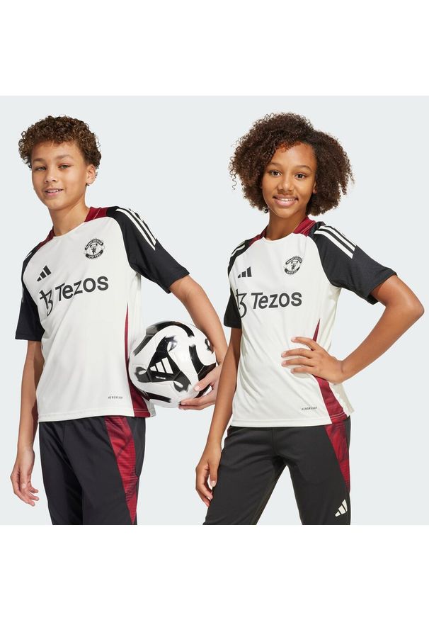 Adidas - Koszulka Manchester United Tiro 24 Training Kids. Kolor: biały, czarny, wielokolorowy. Materiał: materiał