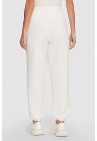 Guess - GUESS Dresowe damskie spodnie w kolorze ecru Cecilia Scuba, Rozmiar M. Kolor: beżowy. Materiał: dresówka #4