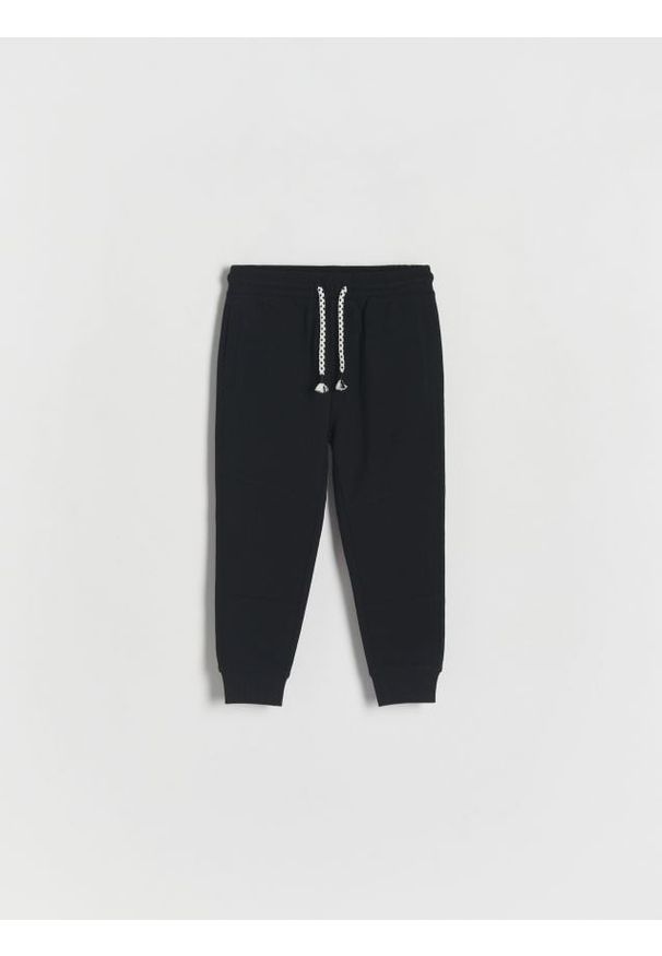 Reserved - Spodnie dresowe jogger - czarny. Kolor: czarny. Materiał: dresówka