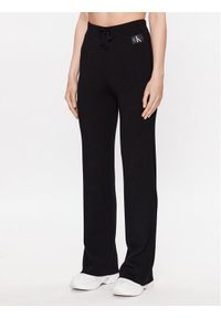 Calvin Klein Jeans Spodnie dresowe J20J222114 Czarny Relaxed Fit. Kolor: czarny. Materiał: lyocell