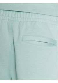 New Balance Spodnie dresowe MP23551 Zielony Relaxed Fit. Kolor: zielony. Materiał: bawełna #4