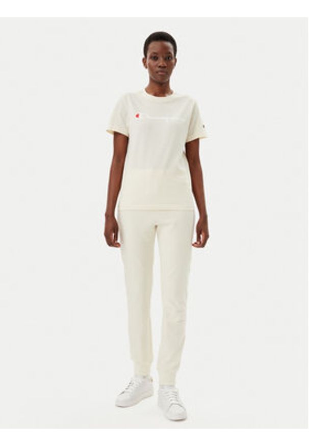 Champion Spodnie dresowe 118101 Écru Slim Fit. Materiał: bawełna