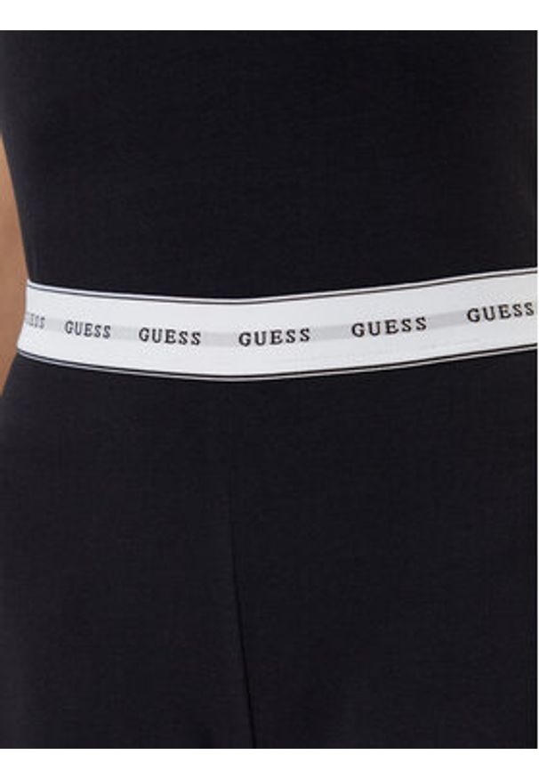 Guess Piżama O5GX13 KBBU1 Czarny Regular Fit. Kolor: czarny. Materiał: syntetyk