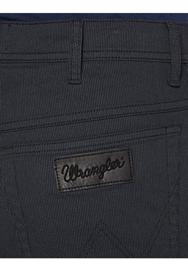 Wrangler - WRANGLER TEXAS SLIM MĘSKIE SPODNIE MATERIAŁOWE MATERIAŁ BLACK W12SW5100 112126525. Materiał: materiał