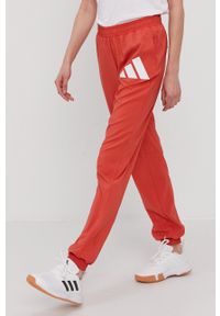 adidas Performance Spodnie damskie kolor czerwony. Kolor: czerwony. Materiał: materiał