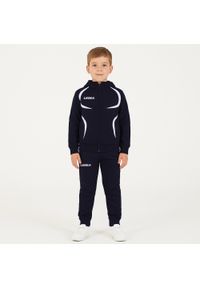 LEGEA - Komplet dresowy dla dziecka TURCHIA JR. Okazja: na uczelnię. Kolor: niebieski, wielokolorowy, biały. Materiał: dresówka. Długość: długie. Styl: sportowy #1
