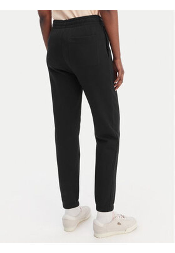 Lacoste Spodnie dresowe XF7604 Czarny Regular Fit. Kolor: czarny. Materiał: dresówka