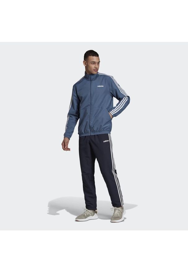 Adidas - Dres adidas Woven Cuffed, Niebieski, Mężczyźni. Kolor: niebieski. Materiał: dresówka. Sport: fitness