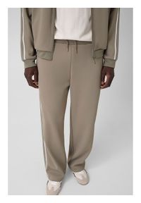 Guess Spodnie materiałowe 183087 Zielony Regular Fit. Kolor: zielony. Materiał: materiał #1