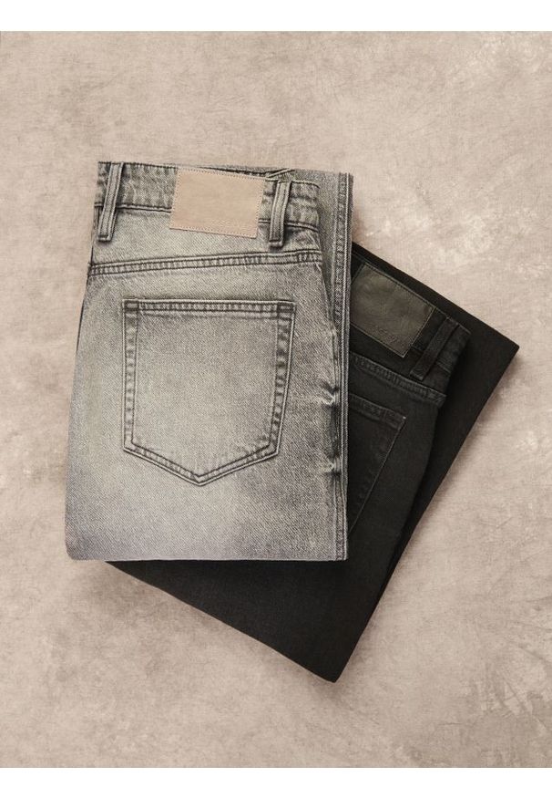 Reserved - Jeansy bootcut z efektem sprania - czarny. Kolor: czarny