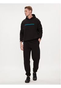 Calvin Klein Spodnie dresowe Color Embossed Logo K10K112688 Czarny Regular Fit. Kolor: czarny. Materiał: bawełna