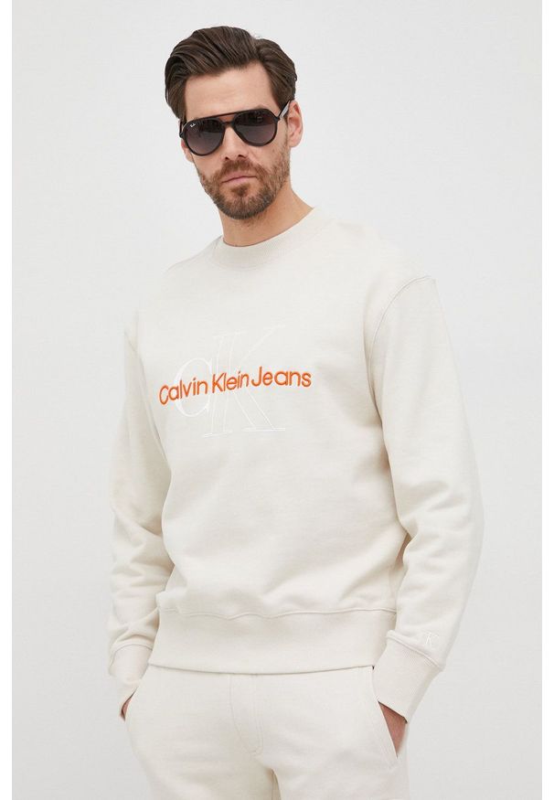 Calvin Klein Jeans bluza bawełniana męska kolor beżowy z aplikacją. Kolor: beżowy. Materiał: bawełna. Wzór: aplikacja