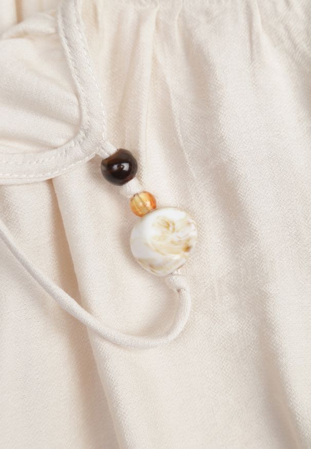 Renee - Beżowa Wiskozowa Sukienka Boho o Pudełkowym Kroju na Ramiączkach z Koralikami Aleino. Okazja: na co dzień. Kolekcja: plus size. Kolor: beżowy. Materiał: wiskoza. Długość rękawa: na ramiączkach. Typ sukienki: dla puszystych. Styl: boho