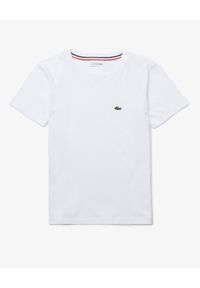 Lacoste - LACOSTE - Biała koszulka z logo. Kolor: biały. Materiał: jersey, bawełna, prążkowany #1