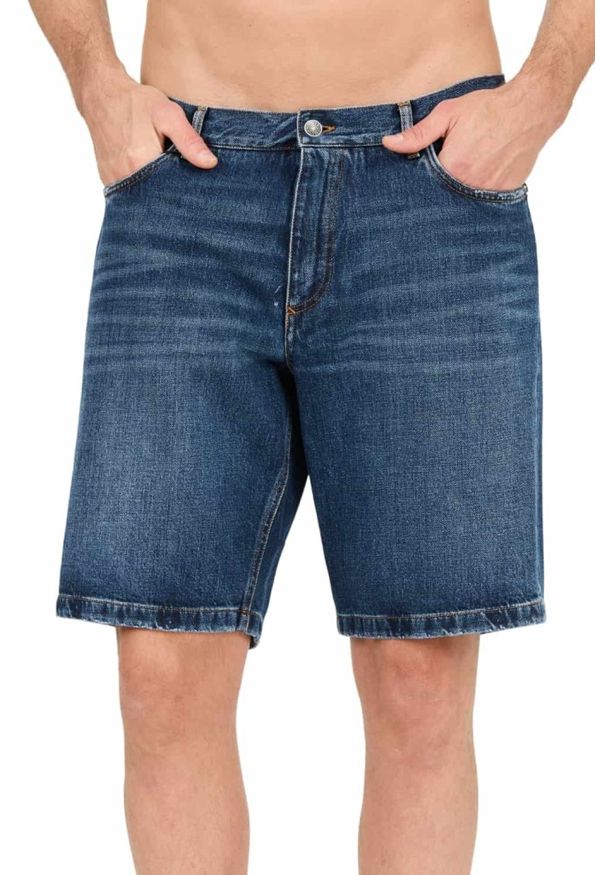 Dolce and Gabbana - DOLCE & GABBANA Jeansowe spodenki. Kolor: niebieski. Materiał: jeans