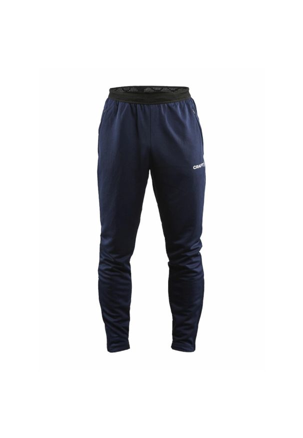Spodnie treningowe męskie Craft Evolve. Kolor: niebieski. Materiał: dresówka. Sport: fitness