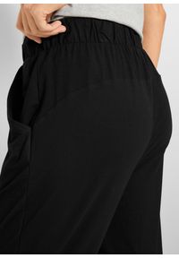 bonprix - Spodnie sportowe ze zrównoważonej wiskozy, dł. 7/8. Kolor: czarny. Materiał: wiskoza. Styl: sportowy #3