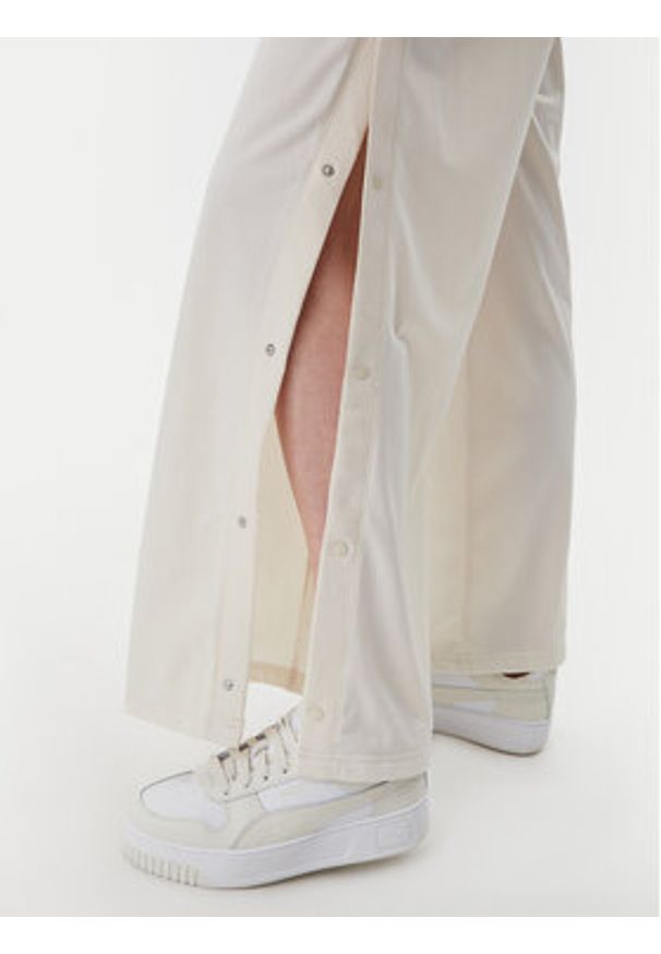 Puma Spodnie dresowe Ess 629804 Beżowy Wide Leg. Kolor: beżowy. Materiał: syntetyk