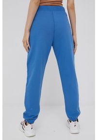 Superdry spodnie damskie gładkie. Kolor: niebieski. Materiał: dzianina. Wzór: gładki