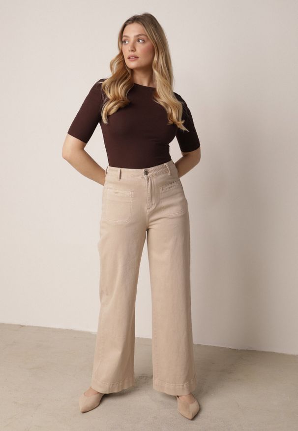 Born2be - Beżowe Bawełniane Jeansy z Szeroką Nogawką i Ozdobnymi Kieszeniami Ginorvienne. Okazja: na co dzień. Stan: podwyższony. Kolor: beżowy. Styl: elegancki, casual, wizytowy