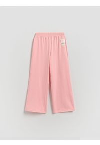 Reserved - Dresowe spodnie wide leg - brzoskwiniowy. Kolor: pomarańczowy. Materiał: dresówka