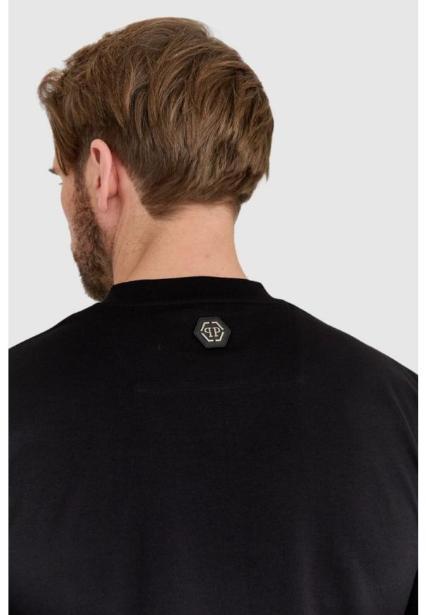 Philipp Plein - PHILIPP PLEIN Czarny męski t-shirt z czaszką zdobioną dżetami. Kolor: czarny. Wzór: aplikacja