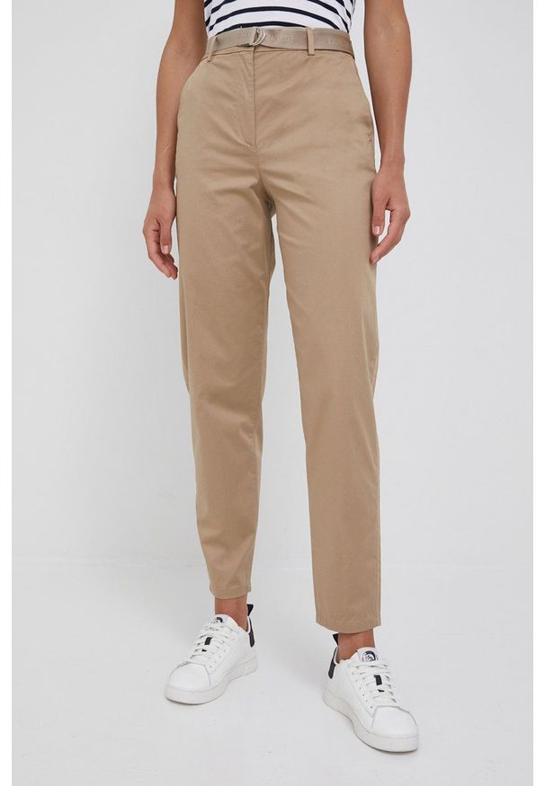 TOMMY HILFIGER - Tommy Hilfiger spodnie damskie kolor beżowy fason chinos high waist. Stan: podwyższony. Kolor: beżowy. Materiał: tkanina