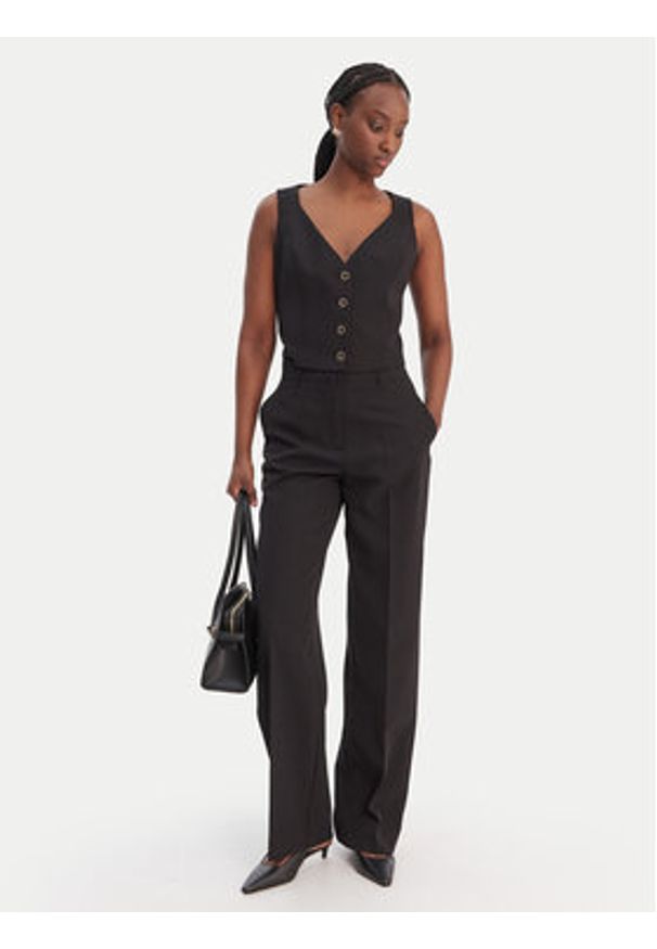 Guess Kamizelka W6RH52 WH9Y2 Czarny Regular Fit. Kolor: czarny. Materiał: syntetyk