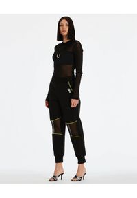 DSG - Czarne spodnie Gym. Kolor: czarny. Materiał: bawełna, dresówka, materiał #2
