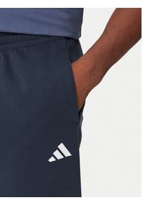 Adidas - adidas Spodnie dresowe Future Icons 3-Stripes JW7088 Granatowy Regular Fit. Kolor: niebieski. Materiał: syntetyk, bawełna #5