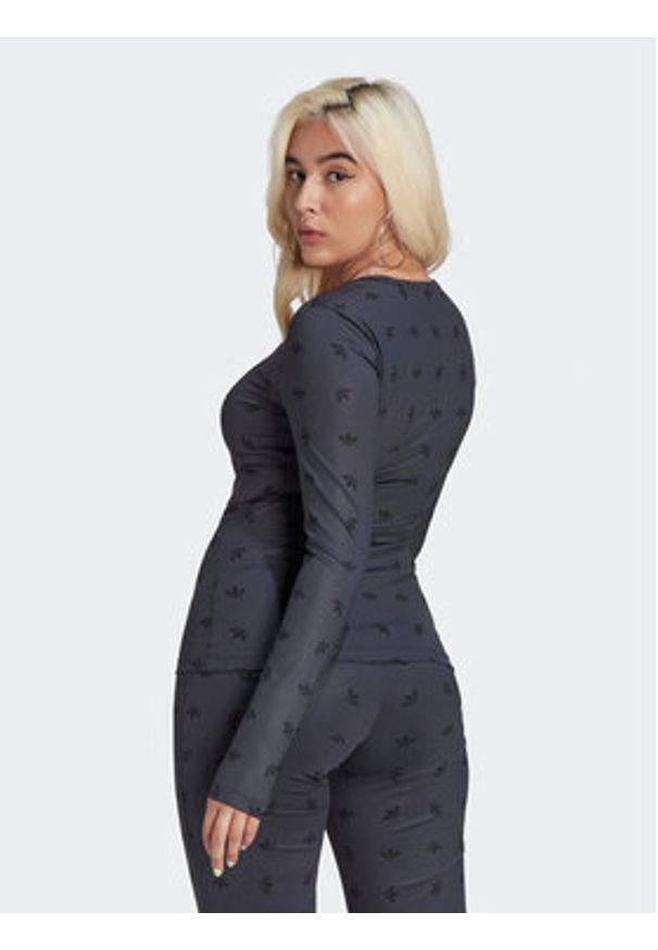 Adidas - adidas Bluzka Allover Print HL9137 Czarny Slim Fit. Kolor: czarny. Materiał: syntetyk. Wzór: nadruk