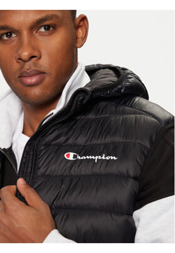 Champion Bezrękawnik 220341 Czarny Regular Fit. Kolor: czarny. Materiał: syntetyk. Długość rękawa: bez rękawów