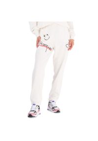 Spodnie Champion Elastic Cuff 116287-WW036 - białe. Kolor: biały. Materiał: dresówka, elastan, bawełna. Wzór: nadruk