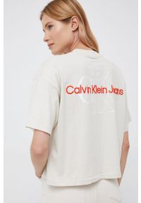 Calvin Klein Jeans t-shirt bawełniany kolor beżowy. Kolor: beżowy. Materiał: bawełna. Wzór: aplikacja #1