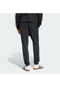 Adidas - adidas Spodnie dresowe Essentials Feel Cozy JE3854 Czarny Regular Fit. Kolor: czarny. Materiał: bawełna #2