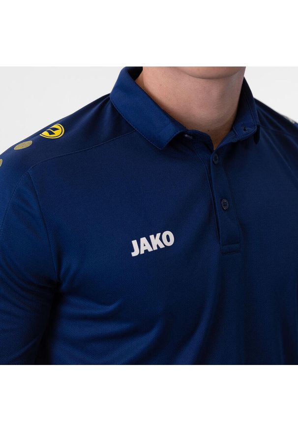 Polo Jako Classico. Typ kołnierza: polo. Kolor: wielokolorowy, niebieski, żółty. Sport: piłka nożna