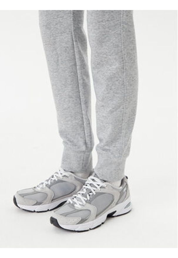 Champion Spodnie dresowe 118101 Szary Slim Fit. Kolor: szary. Materiał: bawełna