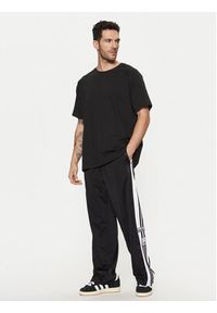 Adidas - adidas Spodnie dresowe Adibreak JD4267 Czarny Loose Fit. Kolor: czarny. Materiał: syntetyk #4