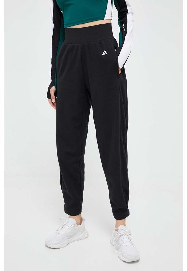 adidas Performance spodnie do jogi Studio kolor czarny gładkie. Kolor: czarny. Materiał: skóra, materiał. Wzór: gładki. Sport: joga i pilates