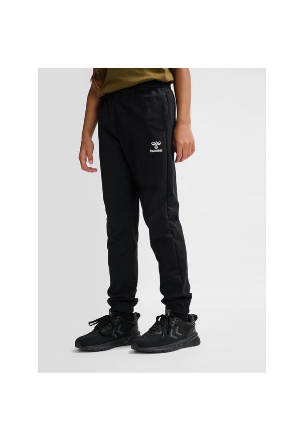 Spodnie dresowe dla dzieci Hummel Go 2.0. Kolor: czarny. Materiał: dresówka. Sport: piłka nożna
