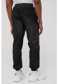 adidas Originals spodnie męskie kolor czarny. Kolor: czarny. Materiał: materiał, tkanina