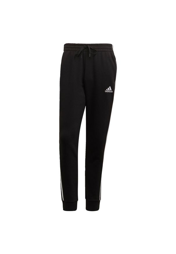 Adidas - Spodnie adidas Essentials Fleece Tapered Cuff 3-Bandes. Kolor: biały, czarny, wielokolorowy. Sport: fitness