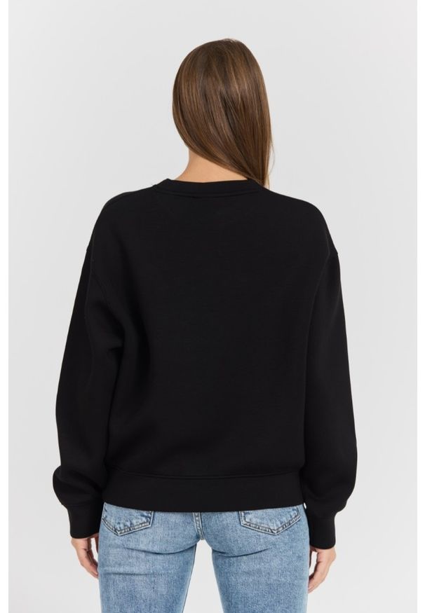 Guess - GUESS Czarna damska bluza z cyrkoniami Cecilia, Rozmiar M. Typ kołnierza: bez kaptura. Kolor: czarny. Materiał: poliamid, wiskoza, materiał, elastan. Długość rękawa: długi rękaw. Długość: długie. Wzór: aplikacja. Styl: elegancki
