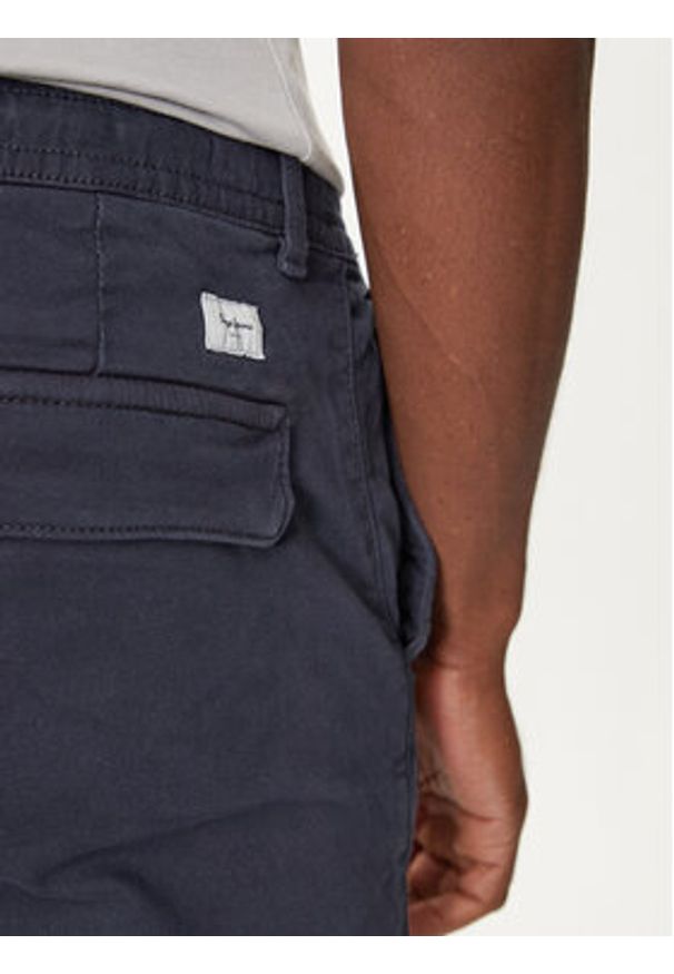 Pepe Jeans Spodnie materiałowe PM211725 Niebieski Slim Fit. Kolor: niebieski. Materiał: bawełna
