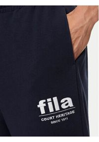 Fila Spodnie dresowe FAM0647 Granatowy Regular Fit. Kolor: niebieski. Materiał: bawełna #5