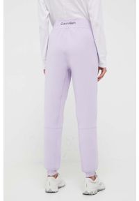 Calvin Klein Performance spodnie treningowe kolor fioletowy gładkie. Stan: podwyższony. Kolor: fioletowy. Wzór: gładki #3