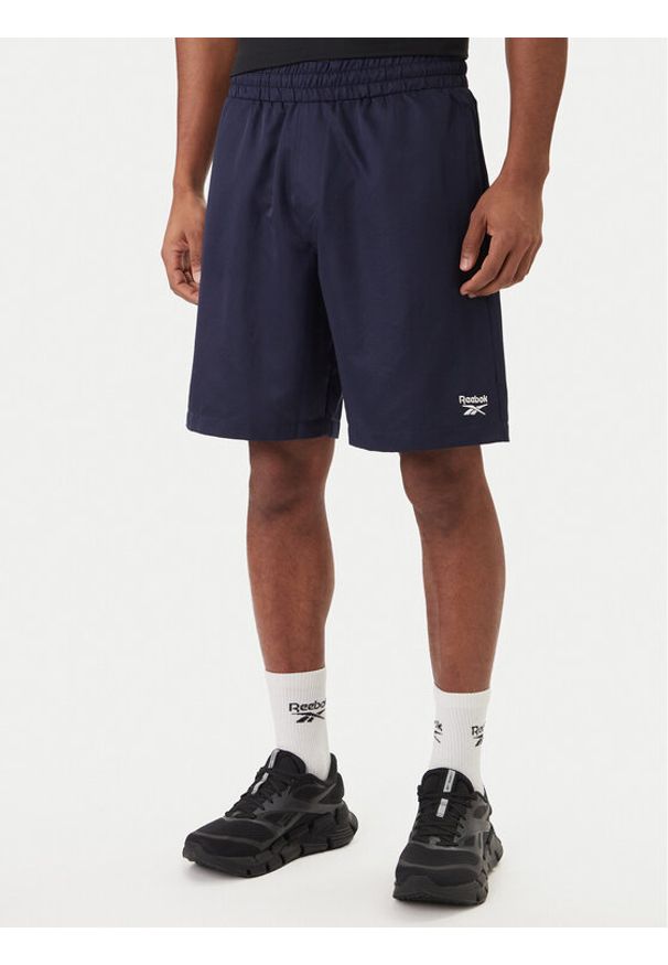 Reebok Szorty sportowe Brennan RK25563CCM Granatowy Regular Fit. Kolor: niebieski. Materiał: syntetyk. Styl: sportowy