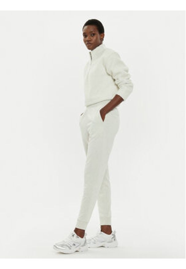 Calvin Klein Performance Spodnie dresowe 00GWS4P651 Beżowy Relaxed Fit. Kolor: beżowy. Materiał: syntetyk