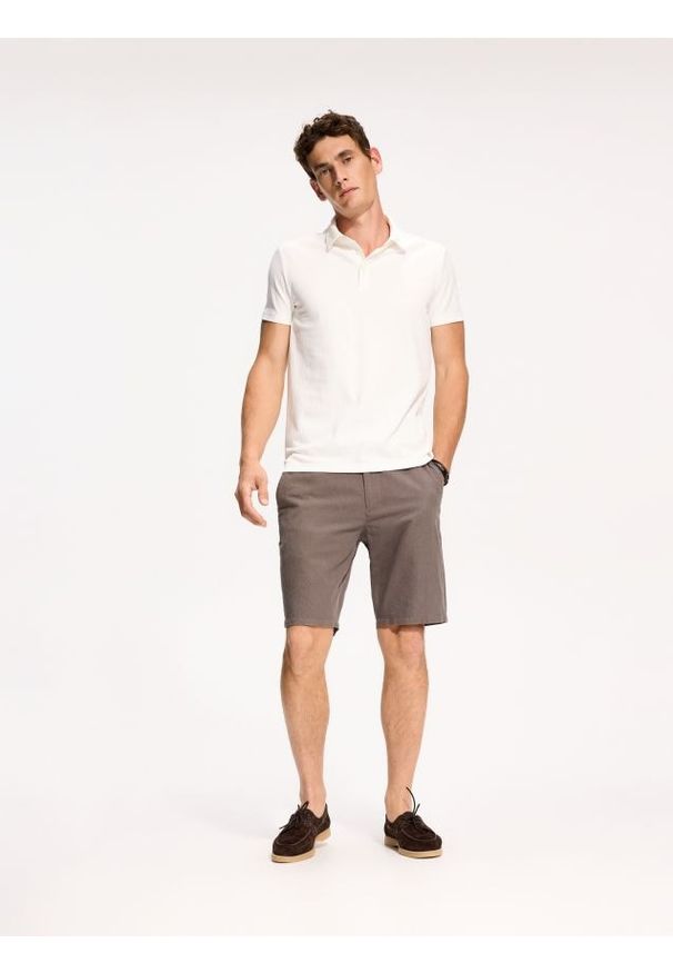 Reserved - Koszulka polo slim - złamana biel. Typ kołnierza: polo. Materiał: bawełna, dzianina