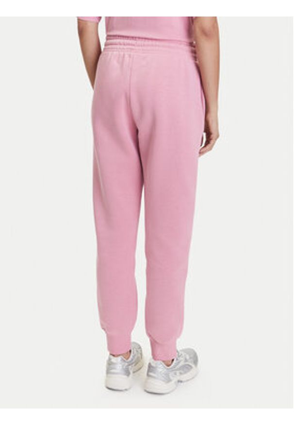 Nike Spodnie dresowe Sportswear Phoenix Fleece FZ7626 Różowy Regular Fit. Kolor: różowy. Materiał: bawełna